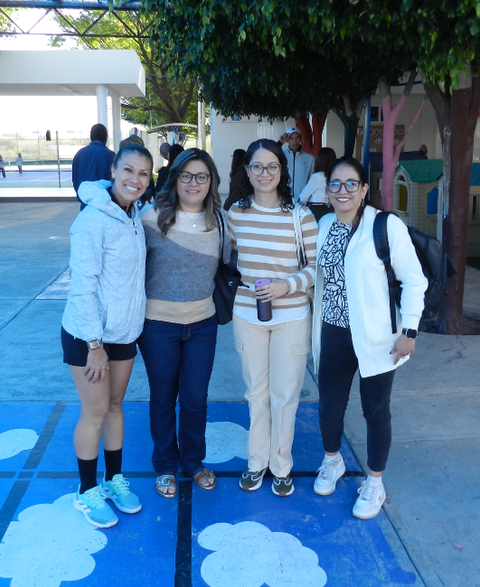 Three people are standing